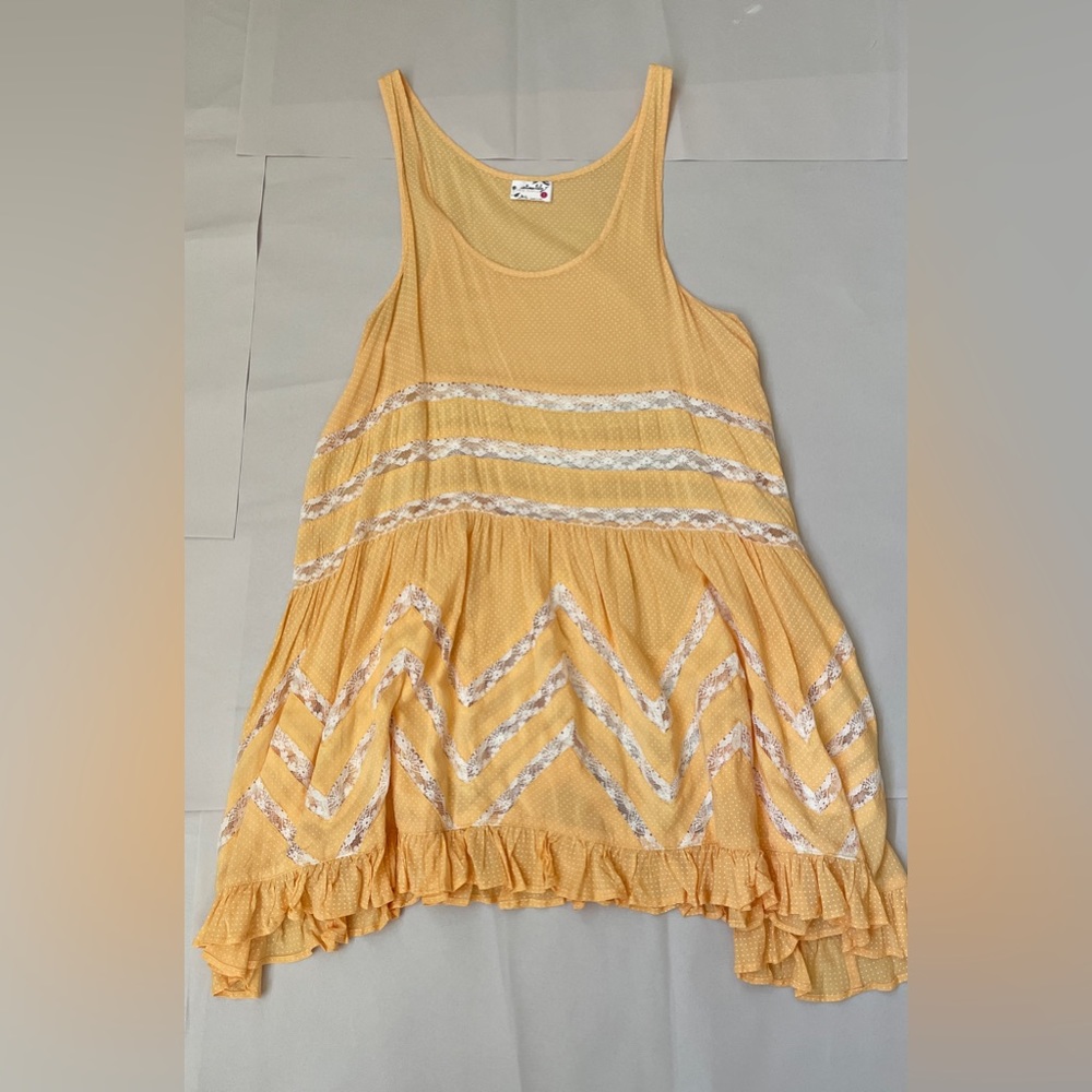 Free people light orange dress. Size small.